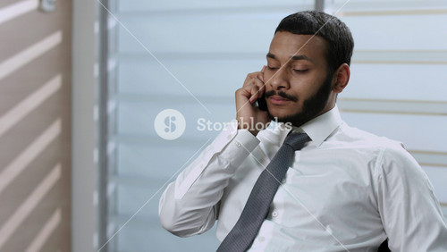 Businessman Talking On The Phone. Unsuccessful Phone Conversation. Frustrated Clerk.