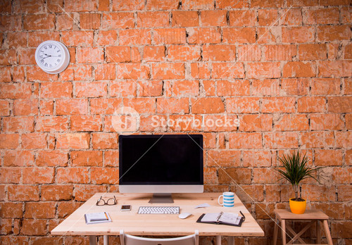 Desk With Various Gadgets And Office Supplies. Computer, Smart Phone And Stationery Around The Workplace. Copy Space.