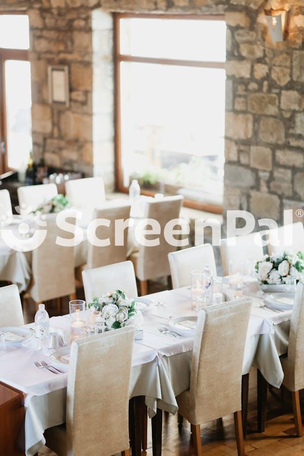 Elegant Wedding Reception Setup In Rustic Venue