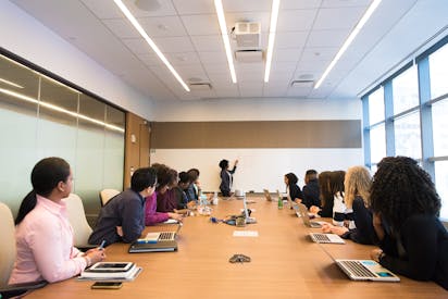 Group Of People On Conference Room