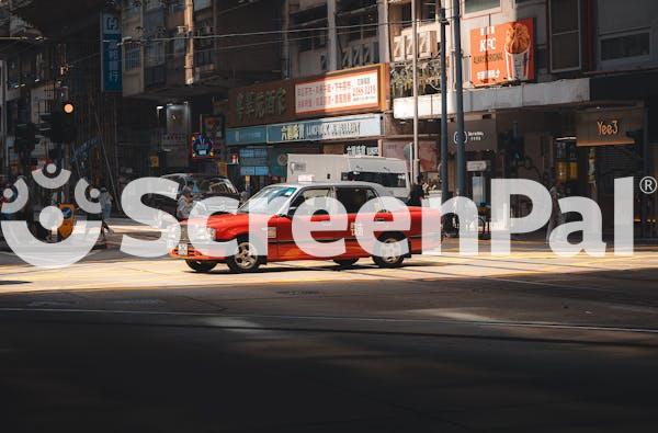 Red Taxi On Hong Kong Street At Daytime